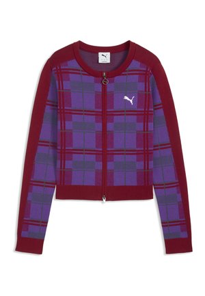 Vest met rits en lange mouwen, met rood-paarse ruitjes, rode manchetten en kraag, en wit Puma-logo op de borst.