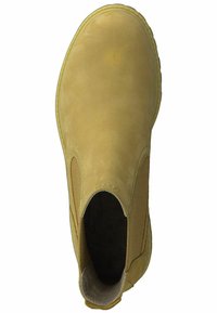 Tan leather ankle boot with elastic side panels, rounded toe, textured upper, and rubber sole. Interior features soft lining.