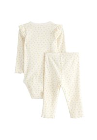 Gul blomstermønstret bodysuit med lange ærmer, rynkede skulderdetaljer og matchende leggins, lavet af blødt ribbet stof.