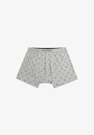 Grijze boxers gemaakt van katoen met een zachte textuur, voorzien van een herhalend klein schedelpatroon in marineblauw, en een elastische tailleband met het label "SCALPERS."