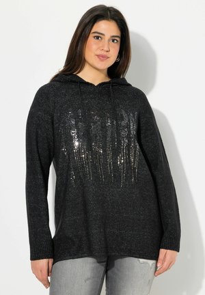 Felpa nera con superficie testurizzata, caratterizzata da un design di paillettes a righe verticali. Maniche lunghe e vestibilità comoda. Polsini a maglia testurizzata.