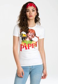 White cotton t-shirt featuring a graphic of a girl with red hair, a monkey, and the text "PIPPI" in bold red letters, short sleeves.