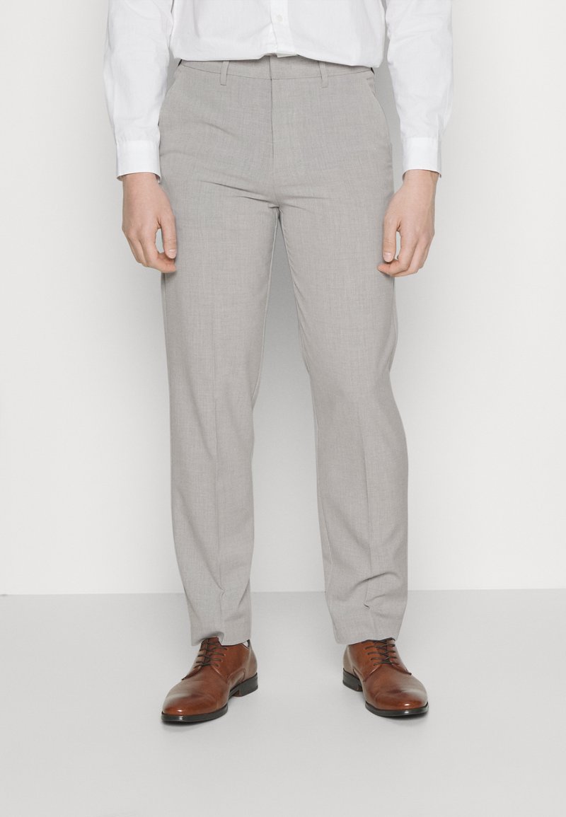 Light gray tailored trousers with a subtle texture, featuring belt loops and a slim fit, paired with brown leather dress shoes.