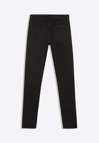 Jean slim noir avec poches arrière et passants de ceinture, posé à plat montrant le côté arrière sur un fond clair uni.