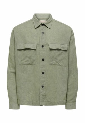 Hellgrünes, langärmliges Hemd mit Knöpfen, zwei aufgesetzten Brusttaschen mit Klappen und spitzem Kragen, aus strukturiertem Stoff gefertigt.