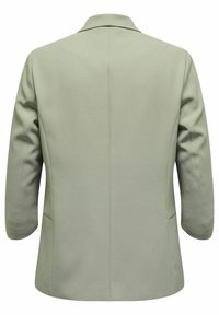 Blazer vert clair à manches longues avec épaules structurées et couture centrale dans le dos, présenté de dos sur fond blanc uni.