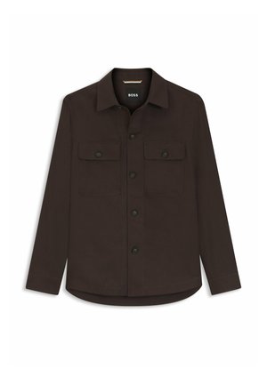 Dunkelbraunes Hemd mit Knopfleiste, zwei Brusttaschen mit Klappen und langen Ärmeln, mit klassischem Kragen und leicht geschwungenem Saum.