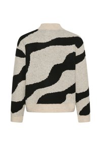 Pull beige en tricot avec motif ondulé noir abstrait, manches longues et poignets côtelés, vu de dos.
