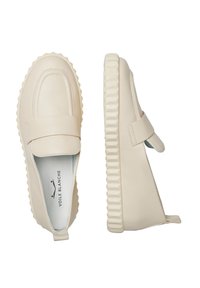 Beige leather slip-on shoes with a textured, ridged sole and a straight toe design. Features a smooth strap across the instep.