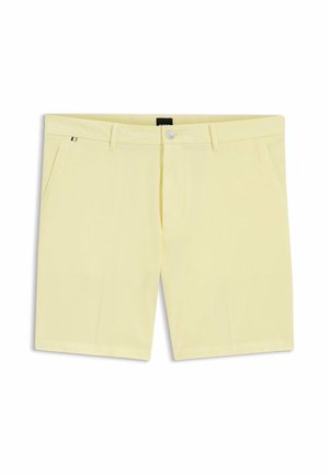 Vaaleankeltaiset, miesten räätälöidyt shortsit, joissa on vyölenkit, etukappaleen nappi- ja vetoketjusulku sekä sivutaskut, esitettynä tasaisesti levitettynä.