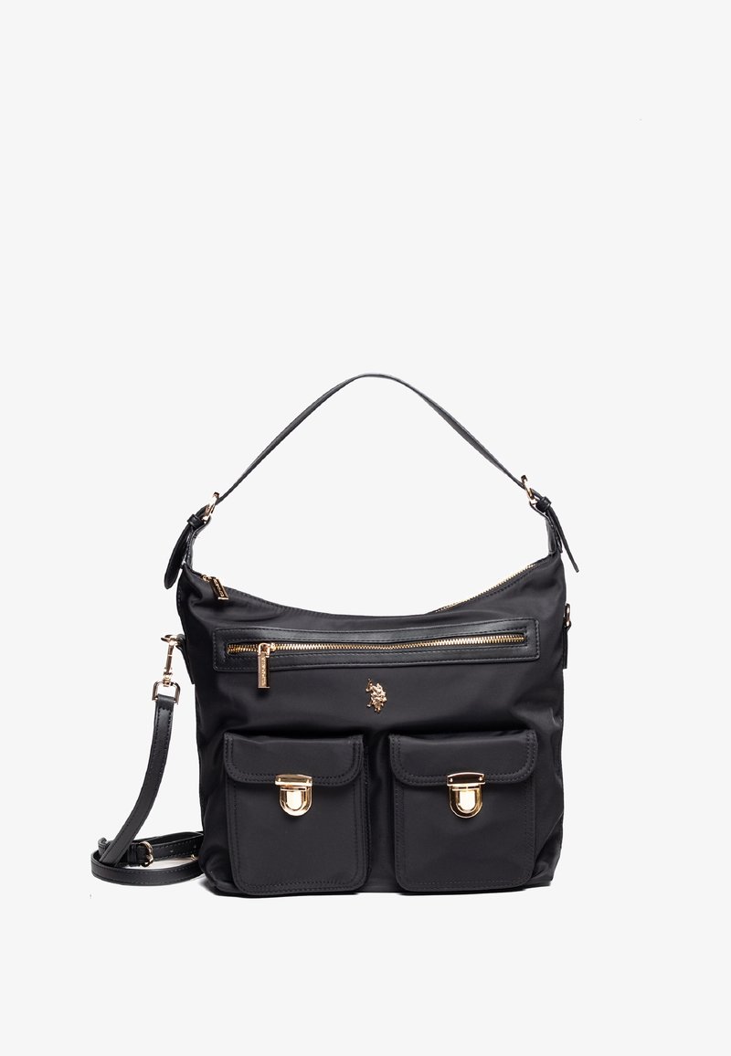 Svart nylontote med guldiga detalj, med en frontficka med dragkedja och två frontfickor med klaff. Justerbar axelrem ingår.