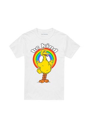 White cotton t-shirt featuring a yellow cartoon bird standing in front of a rainbow, with the text "be kind" above in bold black letters.