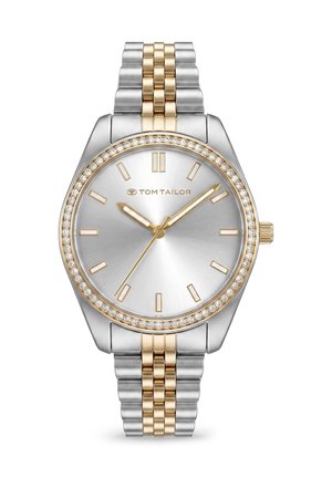 Silberne und goldene Tom Tailor Armbanduhr mit rundem Zifferblatt, goldenen Stundenmarkierungen und kleinen Kristallen rund um die Lünette.