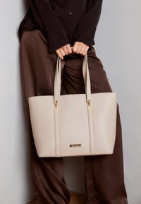 Sélectionné, taupe