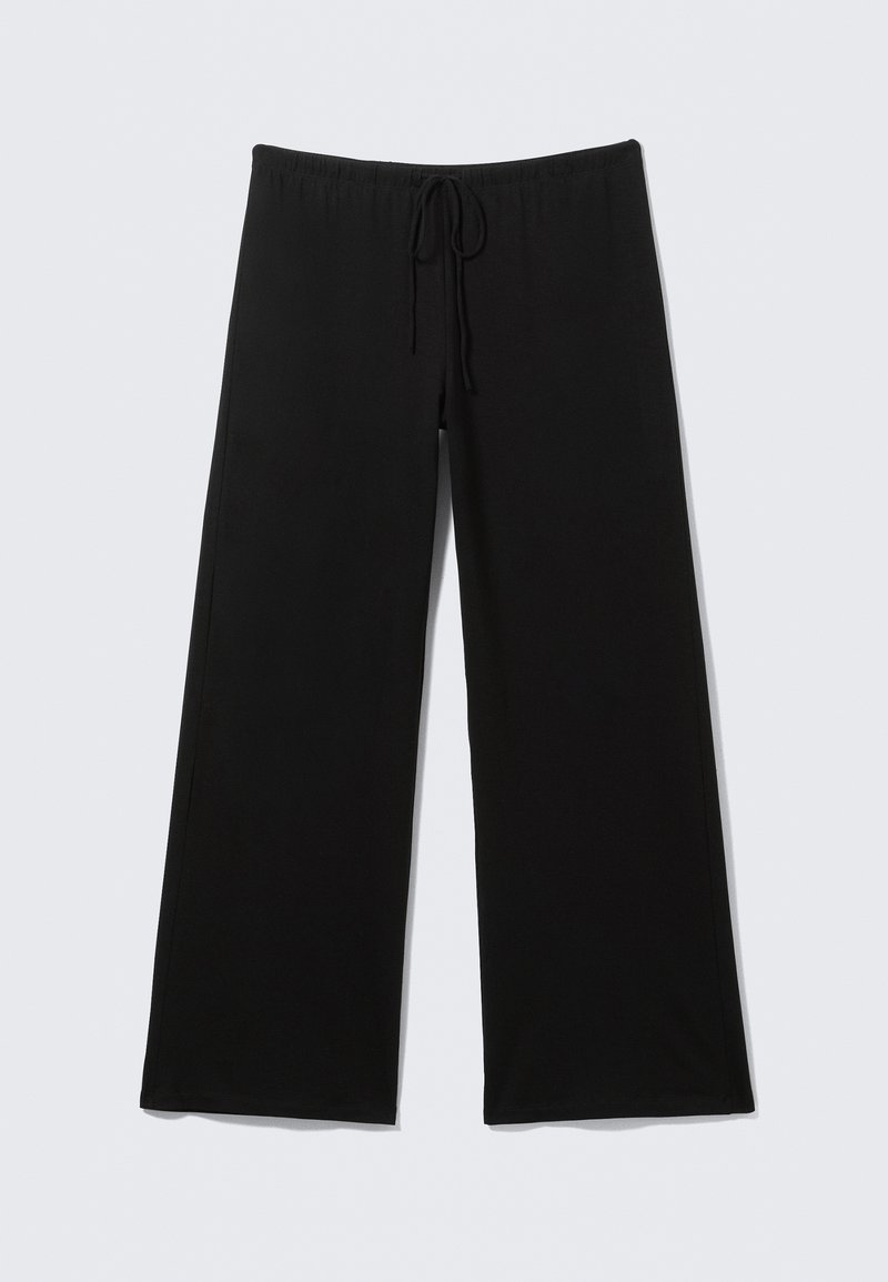 Mustad laia säärega püksid pehmest kangast, mis on varustatud elastse vöökohaga ja nööriga reguleeritava sobivuse ning sileda tekstuuriga.