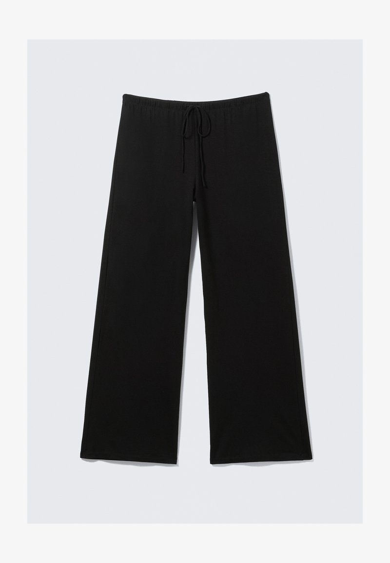 Mustad laia säärega püksid pehmest kangast, mis on varustatud elastse vöökohaga ja nööriga reguleeritava sobivuse ning sileda tekstuuriga.