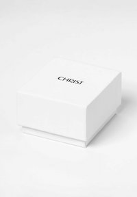 Weißer quadratischer Kasten mit glatter Oberfläche. Auf der Oberseite befindet sich ein schwarzes Logo "CHRIST". Mit einem Scharnierverschluss für einfachen Zugang gestaltet.
