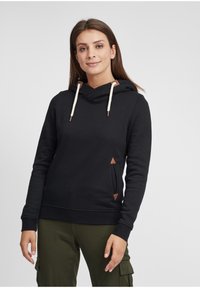 Felpa nera con cappuccio e lacci, con dettagli in pelle, che presenta un design elegante, polsini a costine e dettagli laterali angolari.