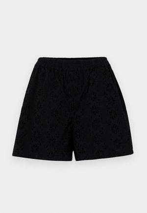 Sorte bomuldsshorts med elastisk talje, prydet med et blomsterøje-mønster og løs pasform, teksturen virker blød og let.