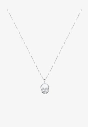 Silver necklace featuring a small skull pendant with detailed facial features. The chain has a fine, interlocking design.