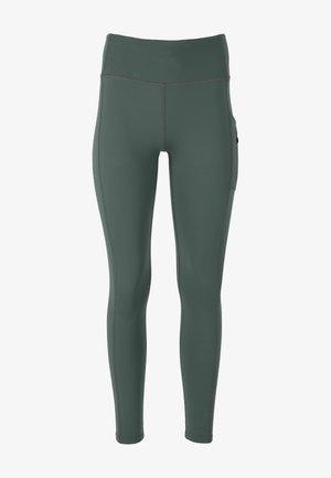 Kompressiolegginsit tummanvihreästä kankaasta, joissa on leveä vyötärönauha, litteät saumat ja sivutasku säilytystä varten.