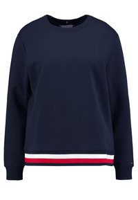 Felpa girocollo blu navy realizzata in misto cotone, con polsini a costine e orlo a strisce nei colori rosso, bianco e blu. Design semplice.