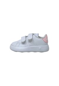 White synthetic sneaker with two Velcro straps, perforated side design, light pink heel accent, and a cushioned sole.