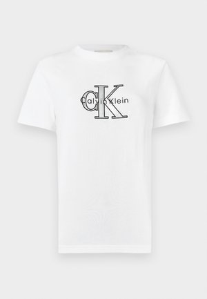 Maglietta bianca in cotone con logo "Calvin Klein" nero e le iniziali "CK" ben visibili. Maniche corte e design classico con scollo a girocollo.