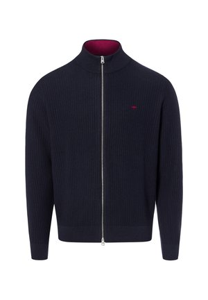 Navy blue ribbed knit zip-up sweater with high collar and small red logo on the left chest.