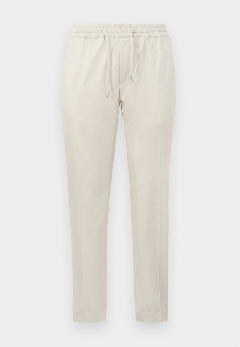 Beige, lichte broek met een elastische tailleband en koord. Rechte pijpen en geen zichtbare zakken, afgewerkt met een zachte textuur.