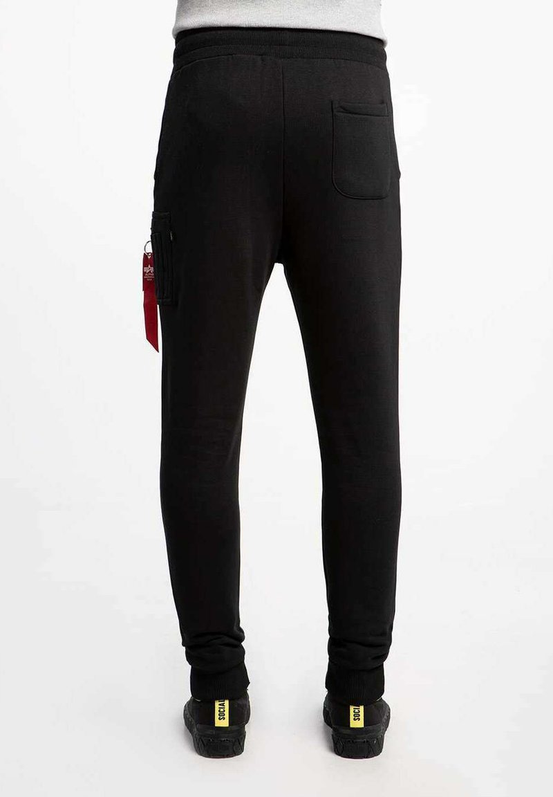 Alpha Industries NASA CARGO Tracksuit bottoms black Zalando