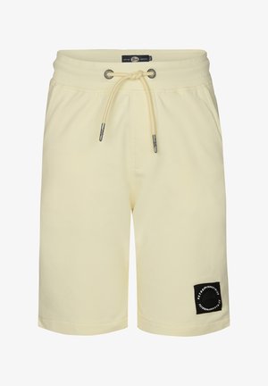 Lichtgele shorts van zacht materiaal, met een elastische tailleband en trekkoord, en een zwart logo-patch op het linkerseizoen.