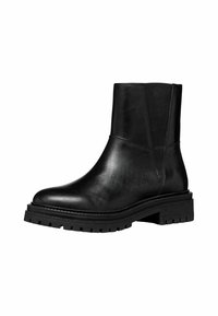 Bottine en cuir noir avec une finition lisse, des panneaux latéraux élastiques et une semelle en caoutchouc épaisse avec un profond relief pour une meilleure adhérence.
