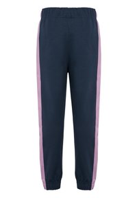 Marina blåa träningbyxor med rosa sidofickor, elastisk midja och muddade benslut. Tillverkade av mjukt tyg, med en avslappnad passform och enkel design.