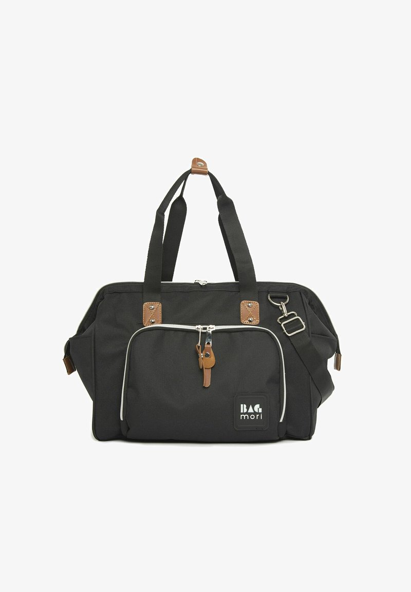 Black fabric duffel bag with brown leather accents, silver zipper, adjustable shoulder strap, and front pocket with a label.