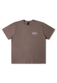 Brown short-sleeve t-shirt made of cotton, featuring a small white graphic logo on the left chest area. Straight-cut design with a classic neckline.
