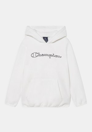Biała bluza z kapturem, wykonana z miękkiego materiału, z kieszenią na przodzie, z napisem "Champion" w stylu ręcznym na klatce piersiowej.