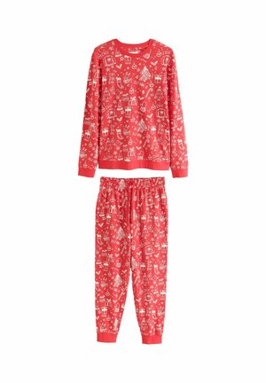 Ensemble pyjama de Noël rouge à manches longues avec des illustrations blanches sur le thème des fêtes, comprenant des arbres, des cadeaux, des cannes en bonbon et des bas.
