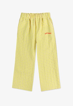 Gelbe Gingham-Muster weite Hosen mit elastischem Bund und rotem gesticktem Text an der Seite. Hergestellt aus leichtem Stoff.