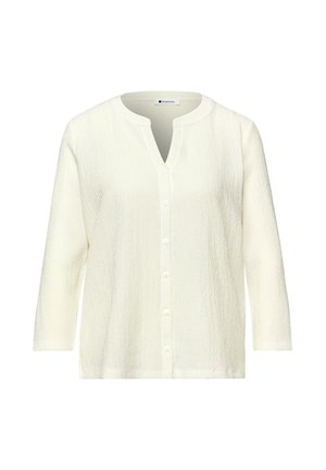 Hvid tekstureret langærmet knappet cardigan med rund halsudskæring, der har et lille V-snit foran.