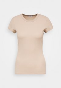 T-shirt beige à manches courtes, côtelé et ajusté, avec encolure arrondie, présenté de face sur un fond blanc uni.