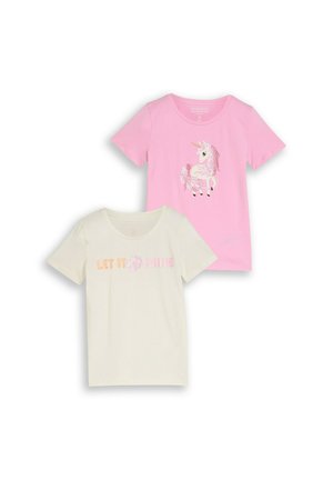 Deux t-shirts manches courtes pour enfants : un rose avec une licorne scintillante, un crème avec le texte "LET IT SHINE" et un motif de fleur.