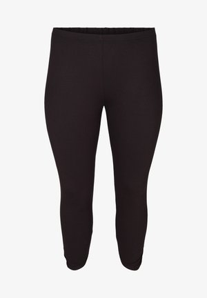 Leggings noirs en matériau extensible, dotés d'une taille élastique et d'un design ajusté, avec une texture lisse et sans embellissement.