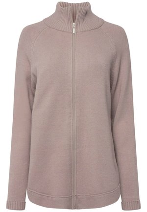 Zippertrøje i blød, lys mauve farve. Har ribkantet krave og manchetter, sømløse skuldre og et struktureret strikmønster overalt.