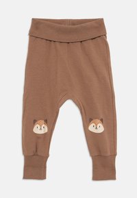 Brown cotton toddler pants with a wide ribbed waistband, featuring two fox face prints on the knees and fitted ribbed cuffs.