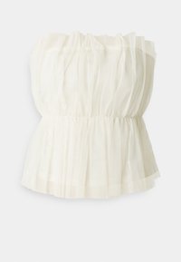 Top senza spalline di colore crema realizzato in tessuto trasparente a strati. Presenta una vita elastica arricciata e una consistenza morbida e fluente.