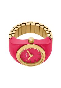 Rosa silikoneur med armbånd af guldfarvet metal. Rund urskive med guld tidsmarkører og visere. "Fossil" logoet vises.