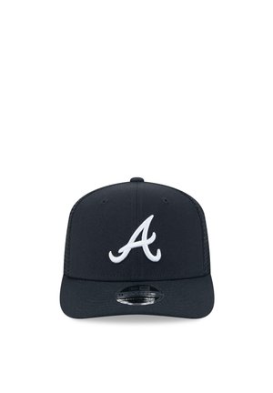 Black baseball cap with white stylized letter "A" on front and a flat visor, displayed against a white background.