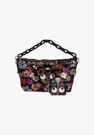 Czarna torebka z cekinami, kolorowymi wzorami kwiatowymi, łańcuszkiem jako uchwytem, ozdobnymi naszywkami oraz odpinaną mini torebką z wyrazistymi oczami i dodatkami.