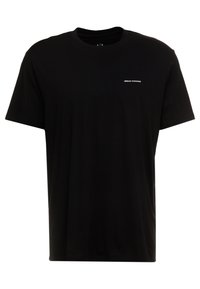 Černé bavlněné tričko s kulatým výstřihem. Na hrudi malé bílé logo "Armani Exchange". Krátké rukávy, standardní střih.